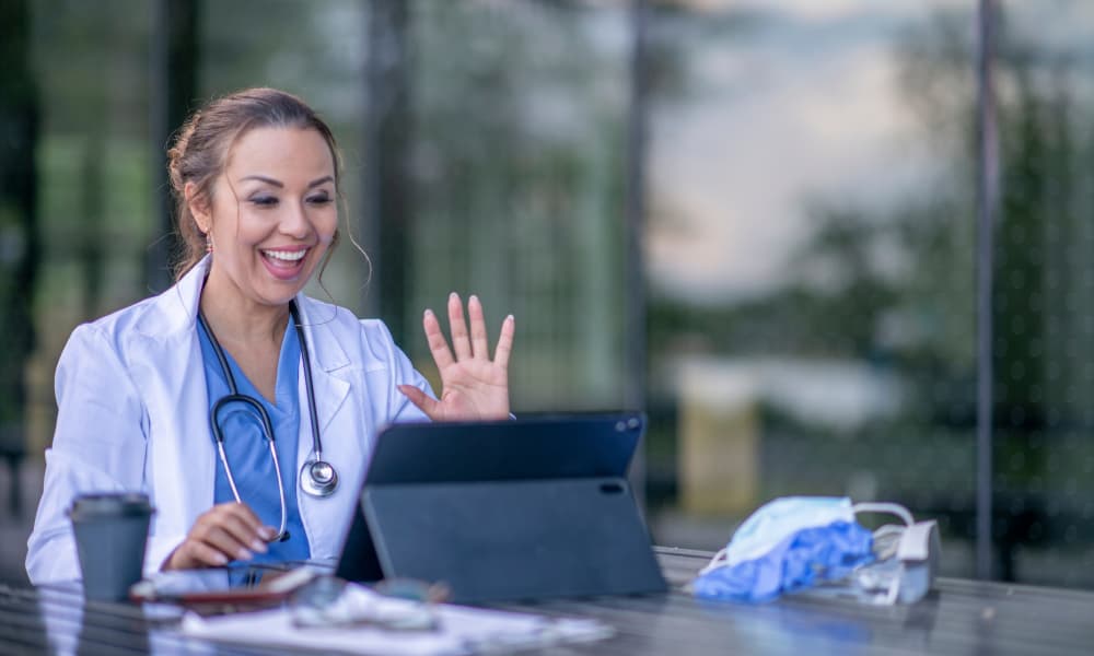 a medical professional providing telehealth care to a patient